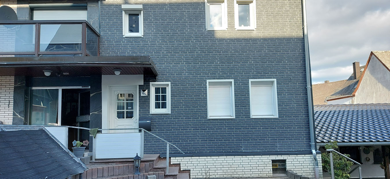 graue Fassadenbekleidung
